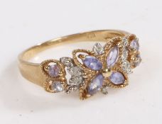 A 9 carat gold, diamond and amethyst ring, the head of floral design set with diamonds and amethyst,