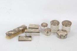 Silver lidded clear glass dressing table pots, various sizes and designs, together with a silver