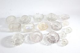 Collection of clear glass salts, piano stands, ashtrays, two sets of Britain's first decimal