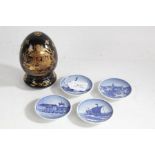 Four Royal Copenhagen small blue and white hanging dishes depicting a boat, windmill and landscape