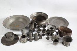 Pewter to include three inkwells, funnel, three pepperettes, alms dish, plate shallow bowl etc. (