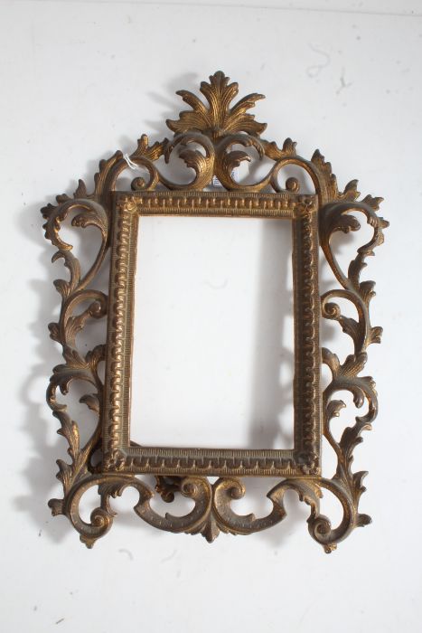 Rococo style gilt metal frame, with pierced swag border, 30cm tall