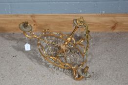 Brass three branch chandelier with crystal glass prism drops