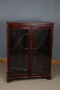 20th century mahogany cabinet, having a pair of astragal glazed doors enclosing adjustable