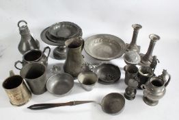 Pewter to include pair of candlesticks, pedestal bowl, two porringers, ladle with turned wooden