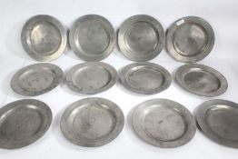 Twelve 19th Century pewter plates, 23cm diameter