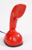 Ericsson "Ericofon" or "Cobra Phone" mid 20th Century telephone, the one piece red plastic body with