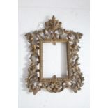 Rococo style gilt metal frame, with pierced scrolling and acanthus leaf border, 31cm tall