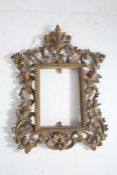 Rococo style gilt metal frame, with pierced scrolling and acanthus leaf border, 31cm tall