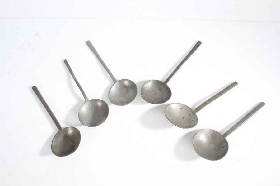 Six 17th century style pewter spoons, with plain stems and bowls, touch marks to bowl (6)