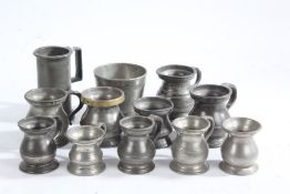 Twelve pewter measures, to include gill, 1/2 gill, 1/4 gill (12)