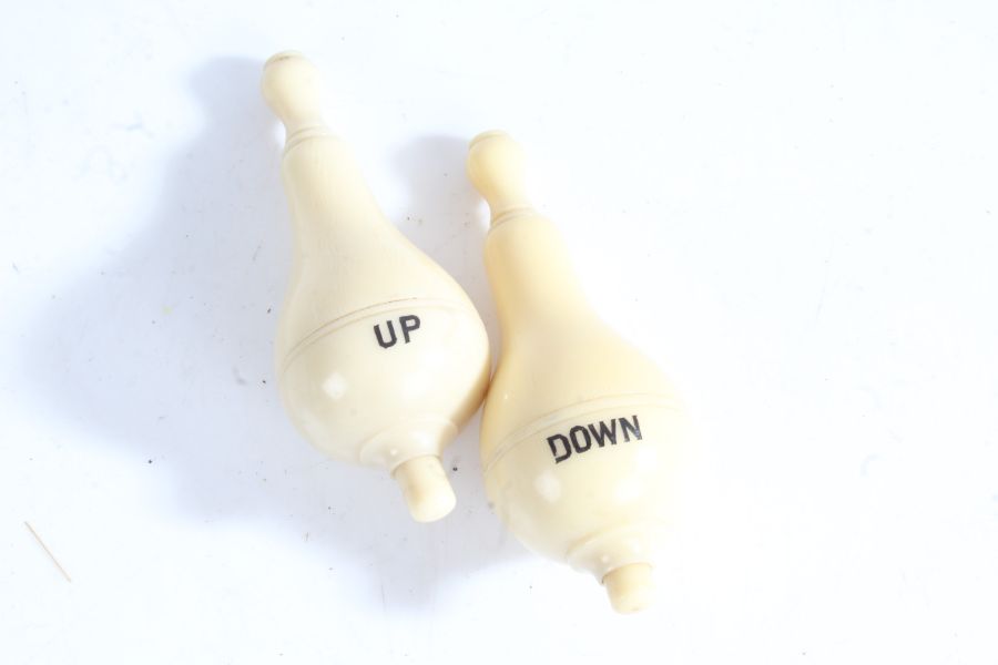 Pair of early 20th century pear shaped electric servants' bell pushes, marked 'Up' and 'Down' for