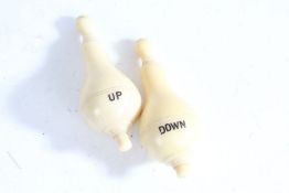 Pair of early 20th century pear shaped electric servants' bell pushes, marked 'Up' and 'Down' for