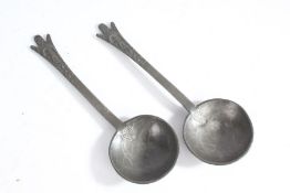 Pair of 15th century style pewter spoons, having figural decorated stems, touch marks to bowl (2)