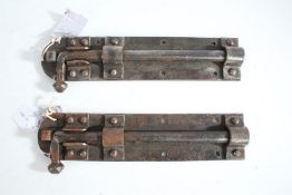 Pair of substantial iron door bolts, 34cm wide