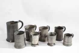Eight 19th Century and later pewter tankards, to include quart, pint and half pint examples (8)