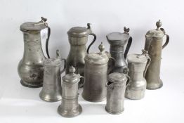 Nine 19th Century later lidded ale and wine flagons, to include examples with acorn form thumbpieces