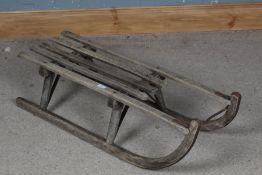 Wooden and metal framed sledge, 92cm long