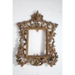 Rococo style gilt metal frame, with pierced scrolling and acanthus leaf border, 31cm tall