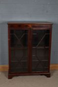 20th century mahogany cabinet, having a pair of astragal glazed doors enclosing adjustable