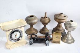 Collection of mixed works of art to include a carriage clock, four oil lamp bases, faux enameled