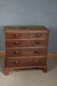 Victorian oak chest, fitted two short over three long graduating drawers, raised on bracket feet,