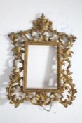 Rococo style gilt metal frame, with pierced scrolling and acanthus leaf border, 31cm tall