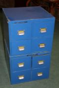 A pair of blue painted metal filing cabinets, each each with four pull out drawers, 52cm wide 51cm