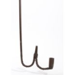 An iron hanging candle/rushlight holder, circa 1800 With with hook terminal, twist-work to the