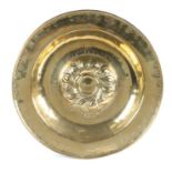 A 16th century brass alms dish, Nuremberg, circa 1500-1550 The central boss of twelve double-