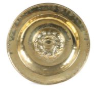 A 16th century brass alms dish, Nuremberg, circa 1500-1550 The central boss of twelve double-