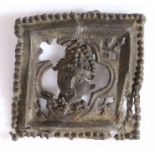 A 14th century pewter pilgrim badge, English Of square form, designed with the head of Thomas