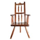 A George III sycamore, ash and oak primitive chair, circa 1780 The gently curved back with two pairs