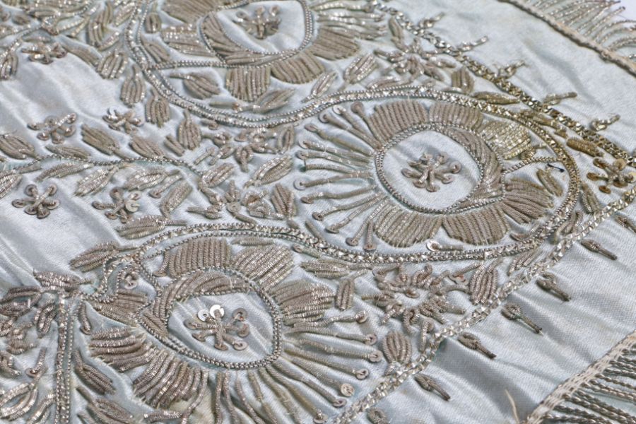 A 19th century Zardozi embroidery panel Worked in white metal bullion, plate metallic threads and - Image 2 of 2