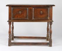A late 17th century oak table, circa 1680 Having a twin-boarded top with applied ovolo-moulded edge,