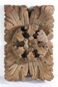An early 18th century carved oak and painted roof boss, circa 1700-50 Of rectangular form, centred