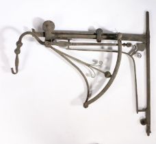 A George III wrought iron chimney crane, circa 1800 Of typical form, with one ratchet arm, and
