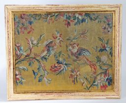 An early 18th century tapestry panel, French, circa 1715-25 Designed as a pair of fanciful-birds,
