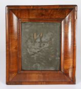 A William & Mary figured-walnut mirror, circa 1690 With cushion-moulded frame, moulded slip and