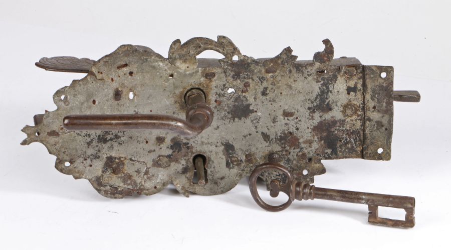 A 17th century tinned steel lock, German With handle and key, 33cm wide, 14cm high, 17cm deep