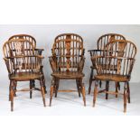 A harlequin set of six ash and elm low back Windsor armchairs, Lincolnshire, circa 1830 Each hoop