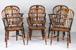 A harlequin set of six ash and elm low back Windsor armchairs, Lincolnshire, circa 1830 Each hoop