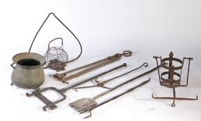 A collection of 18th century and later domestic metalware To include a chimney crane,  cauldron,