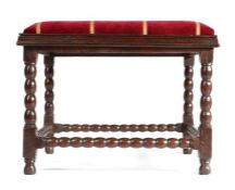 A Charles II oak and upholstered stool, circa 1680 With drop-in padded seat upholstered in crimson