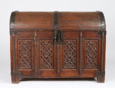 An interesting mid-16th century oak dome topped chest, circa 1550 The boarded-domed lid hinged to