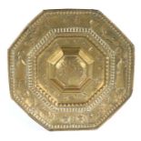 A late 17th century embossed brass octagonal mural light reflector, Scandinavian/Dutch, circa 1680