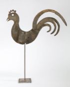 An 18th century sheet iron cockerel weathervane Designed with four tail feathers, curved body rising