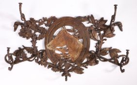 Coalbrookdale: an equine cast iron coat/whip rack Centred by the bust of a horse, framed by a large