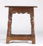 A Charles I oak joint stool, circa 1630 The top with double reeded-edge, the rails with bicuspid-