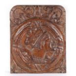 A 16th century oak Romayne-type panel, circa 1540 Designed as a profile bust of a king, wearing a